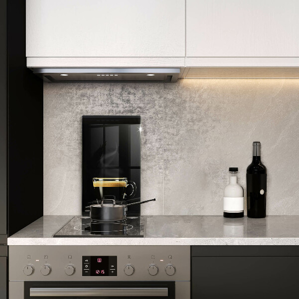 De vidrio templado Un vaso de café negro