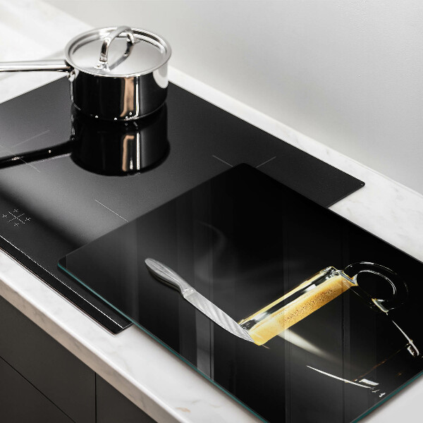 De vidrio templado Un vaso de café negro