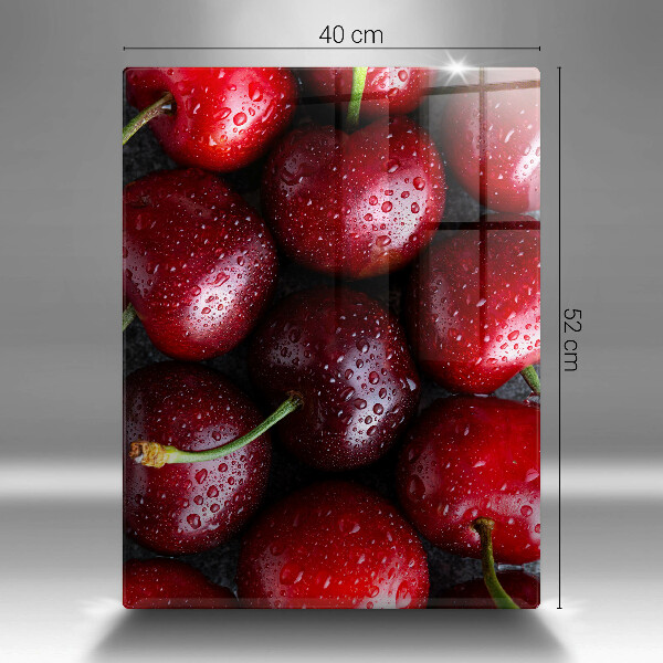 Tabla de cortar de vidrio Primer plano de cerezas