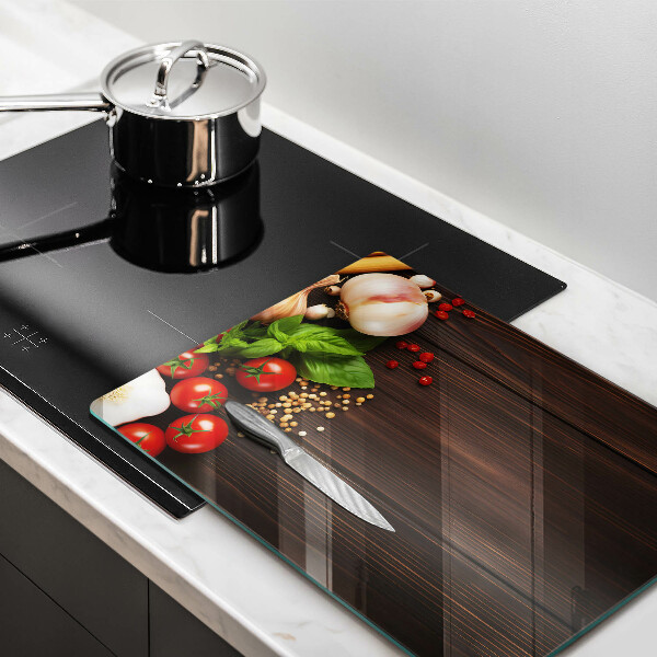 Tabla de cortar de vidrio Verduras en la mesa