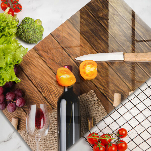 Tabla de cortar de vidrio Una botella de vino tinto