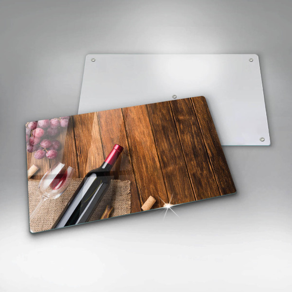 Tabla de cortar de vidrio Una botella de vino tinto