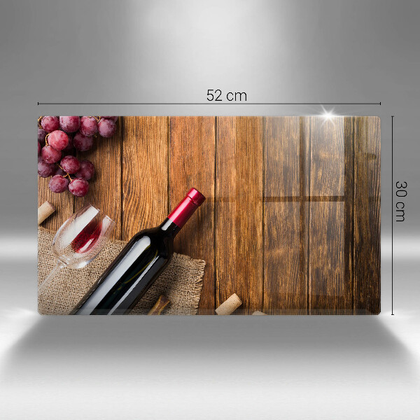 Tabla de cortar de vidrio Una botella de vino tinto