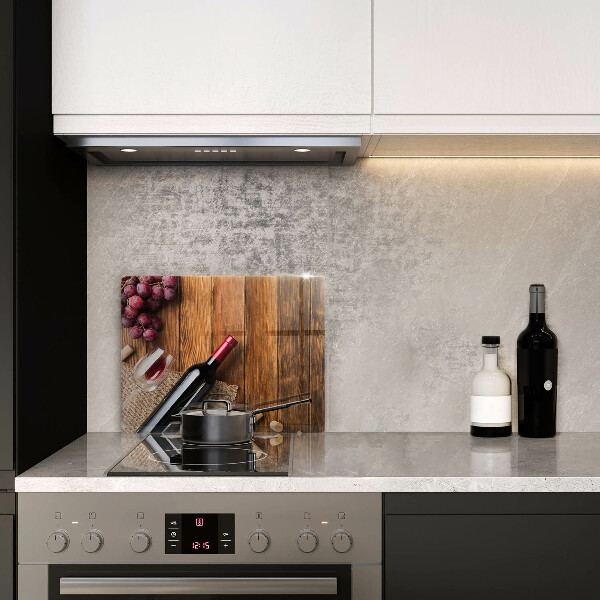 Tabla de cortar de vidrio Una botella de vino tinto