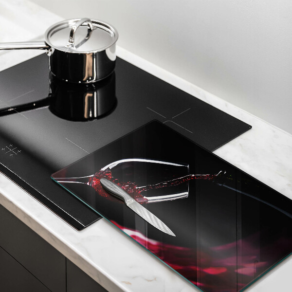 Tabla de cortar de vidrio Una copa de vino tinto