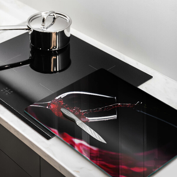 Tabla de cortar de vidrio Una copa de vino tinto