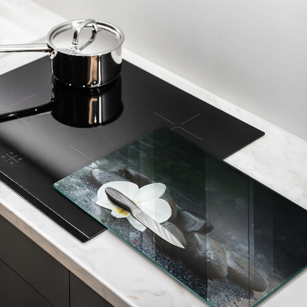 Tabla de cortar de vidrio Piedras zen de flor blanca