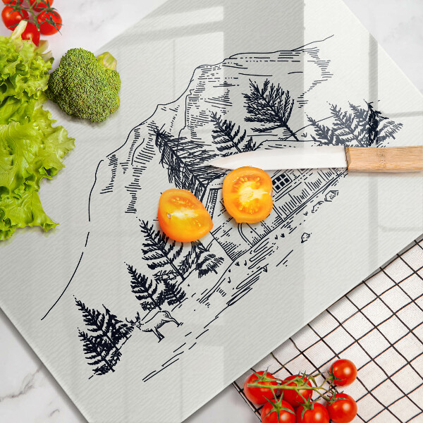 Tabla de cortar de vidrio Dibujo de una cabaña en las montañas