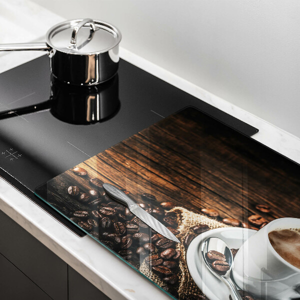 Tabla de cortar de vidrio Taza y granos de café