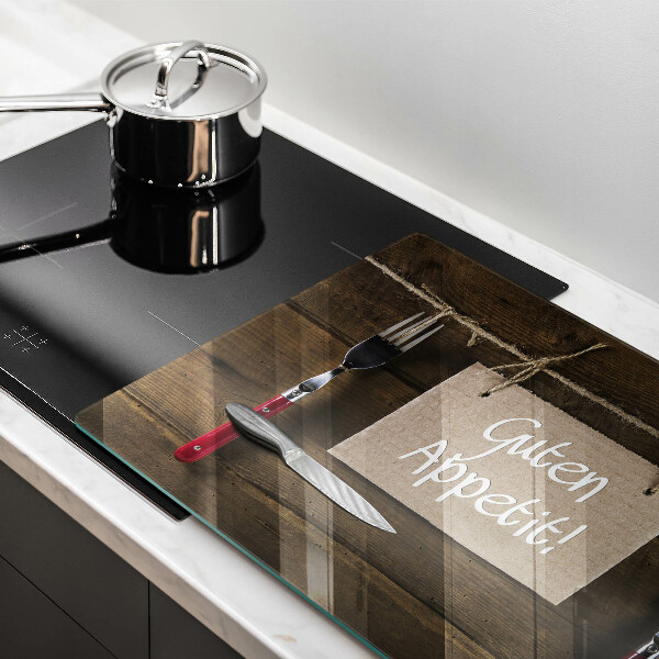 Tabla de cortar de vidrio Inscripción guten appetit sobre tablas de madera