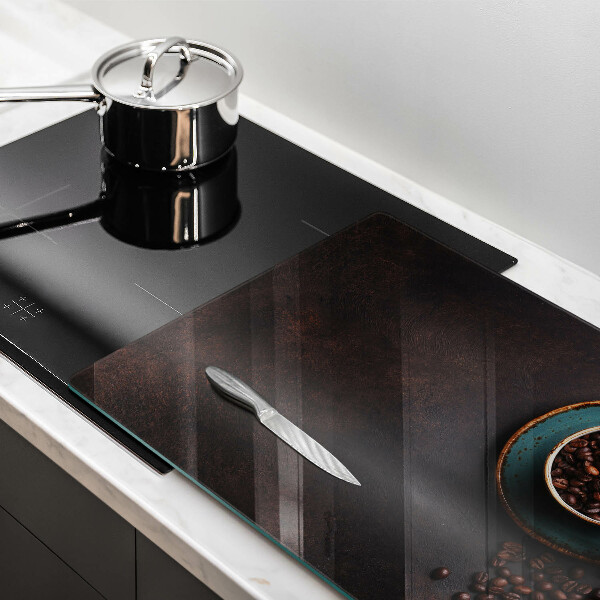 Tabla de cortar de vidrio Una taza de granos de café