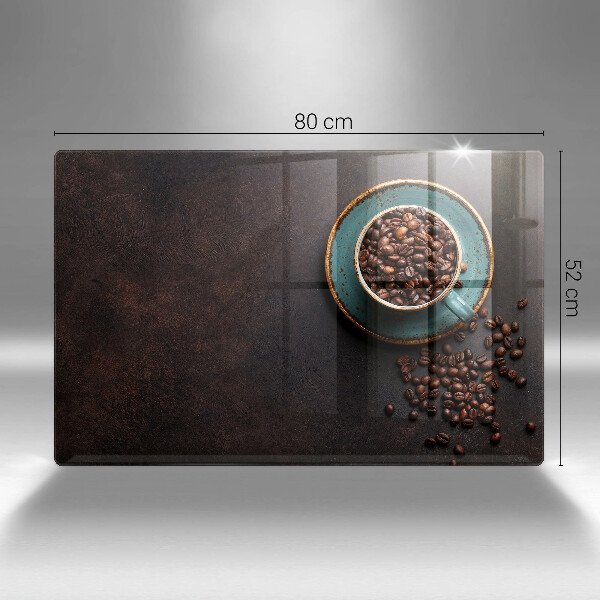 Tabla de cortar de vidrio Una taza de granos de café