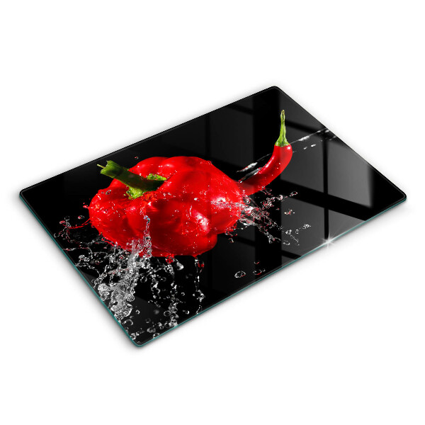 Tabla de cortar de vidrio Pimientos rojos en agua