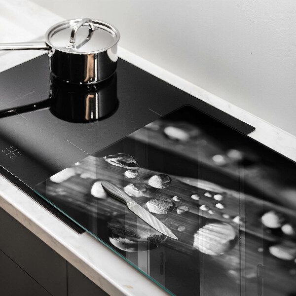 Tabla de cortar de vidrio Gotas de rocío sobre las hojas