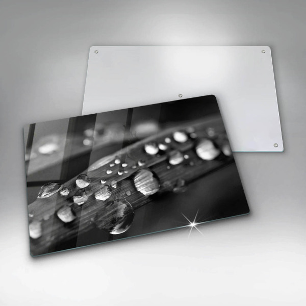 Tabla de cortar de vidrio Gotas de rocío sobre las hojas