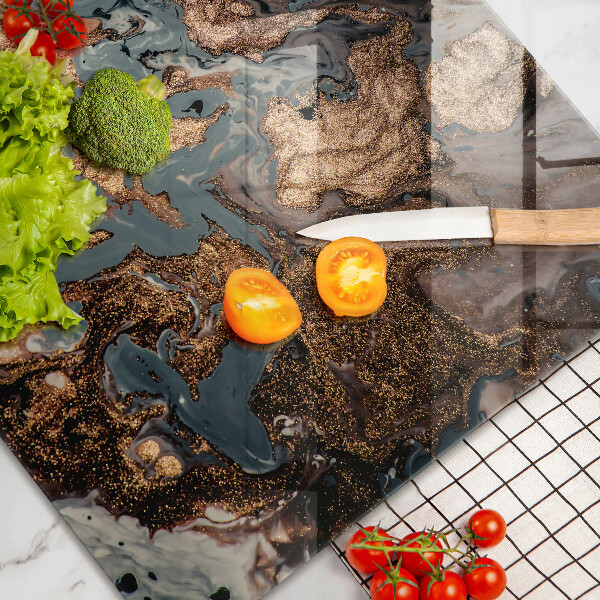 Tabla de cortar de vidrio Estructura de roca dorada