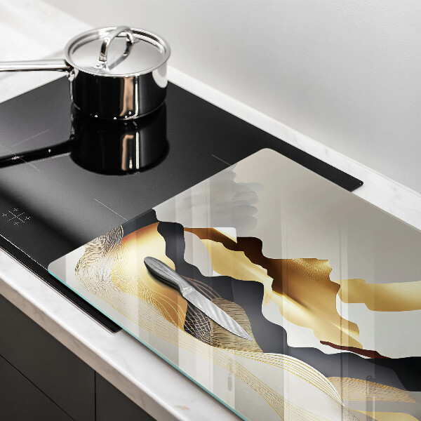 Tabla de cortar de vidrio Montañas doradas abstractas