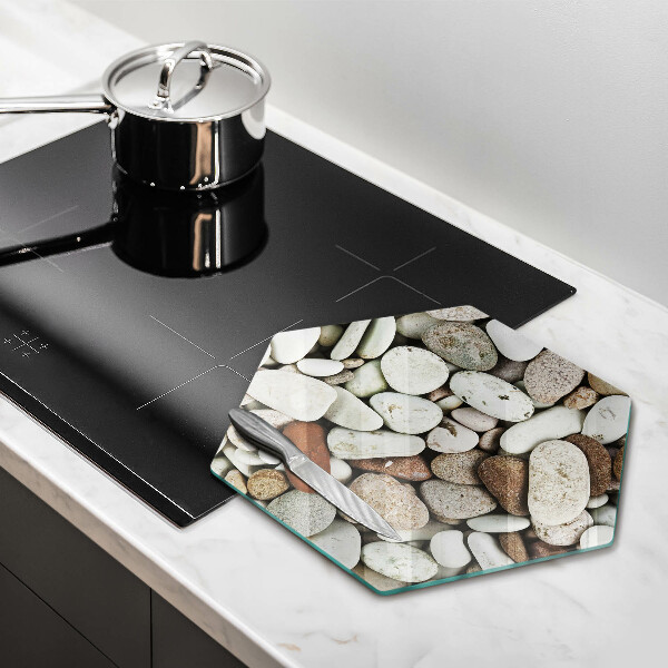 Tabla de cortar de vidrio Fondo de piedras pequeñas