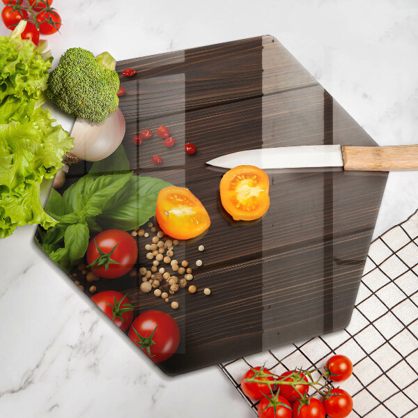 Tabla de cortar de vidrio Verduras en la mesa