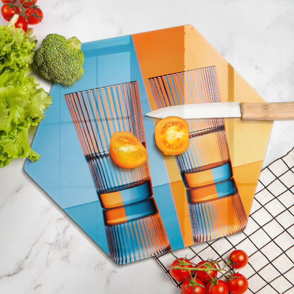 Tabla de cortar de vidrio Dos vasos de agua