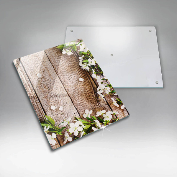 Cubre encimera Flores blancas en las tablas.