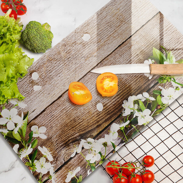 Cubre encimera Flores blancas en las tablas.