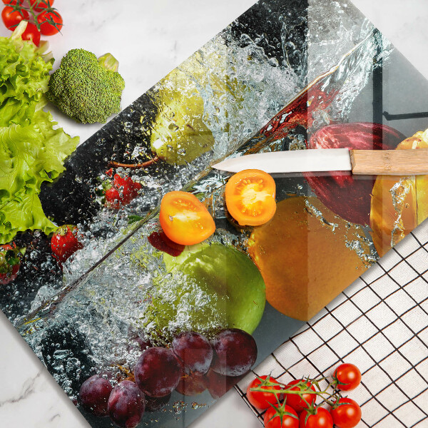 Cubre vitrocerámica Fruta jugosa en agua.