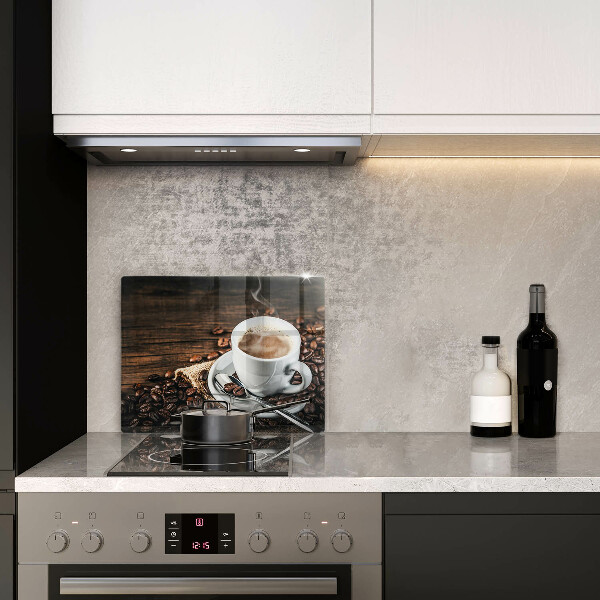 Cubre vitrocerámica Taza y granos de café.