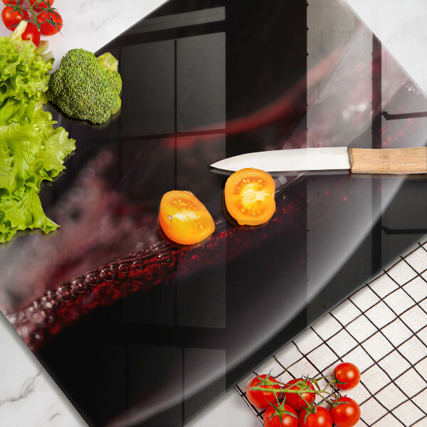 Cubre vitrocerámica Vino tinto en una copa