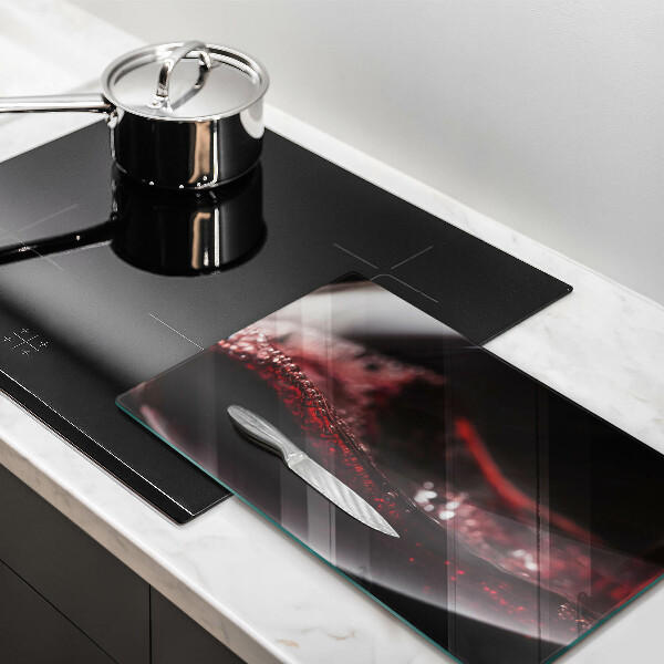 Cubre vitrocerámica Vino tinto en una copa