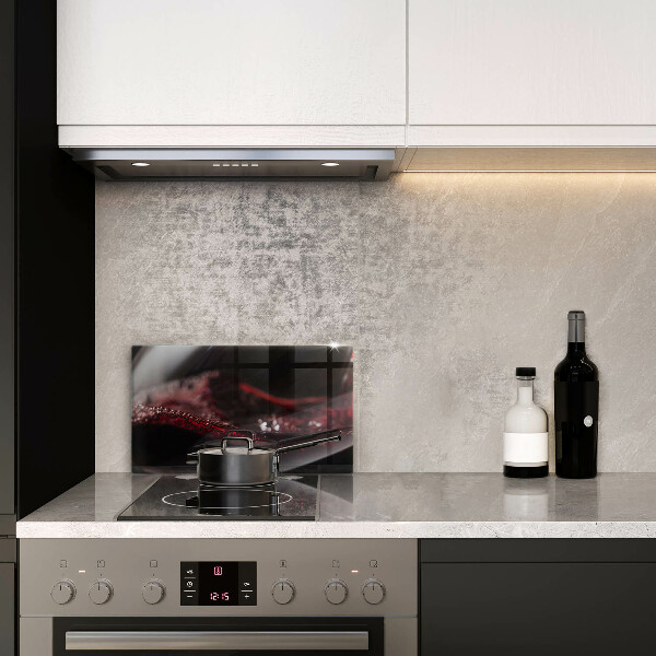 Cubre vitrocerámica Vino tinto en una copa