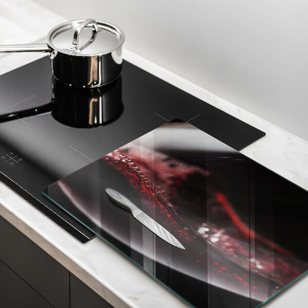 Cubre vitrocerámica Vino tinto en una copa