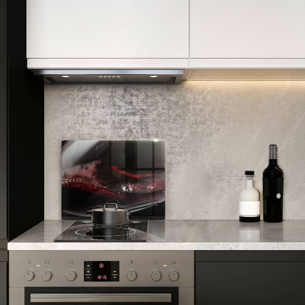 Cubre vitrocerámica Vino tinto en una copa