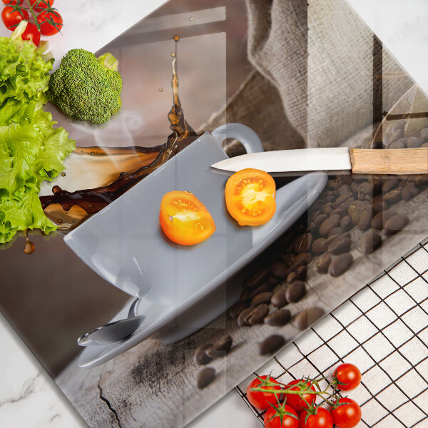 Cubre vitrocerámica Taza y granos de café.