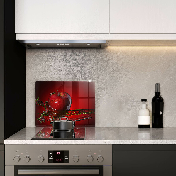 Cubre vitrocerámica fruta de manzana en agua