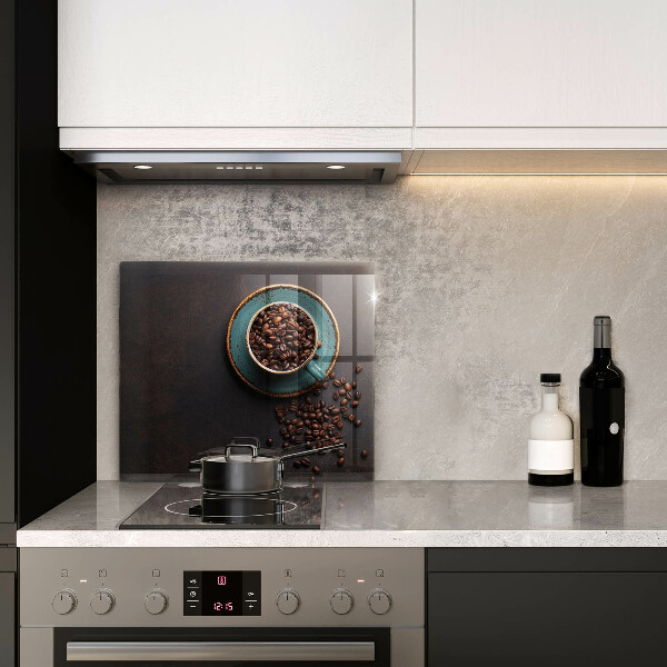 Protector encimera Una taza de granos de café