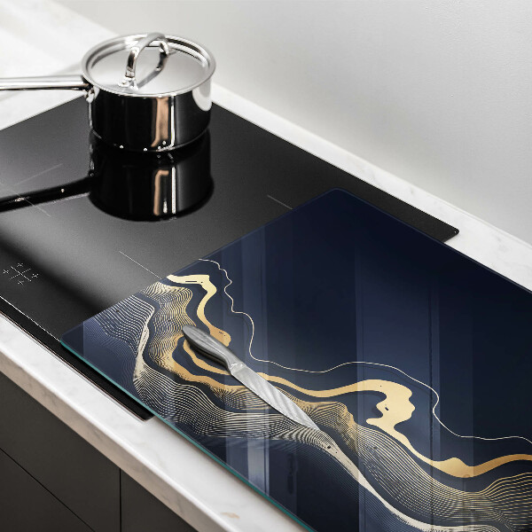Cubre vitrocerámica Líneas doradas abstractas