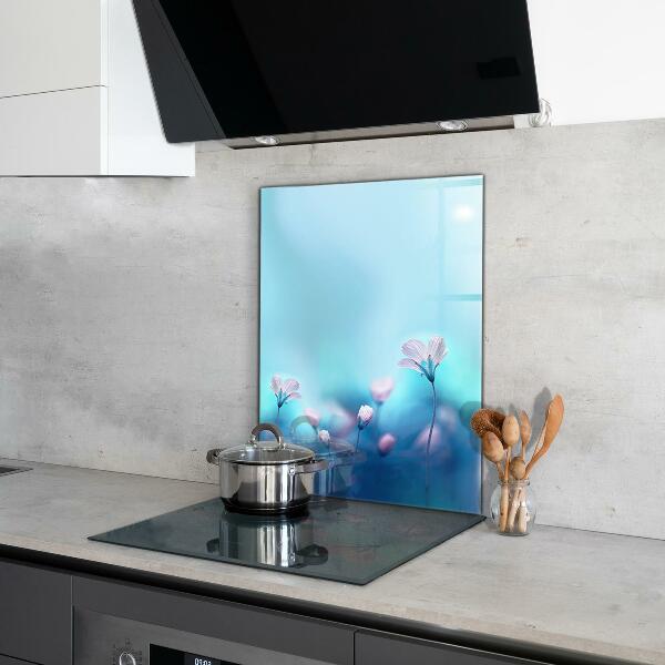 Paneles de vidrio para la cocina Flores detrás de la niebla de la mañana