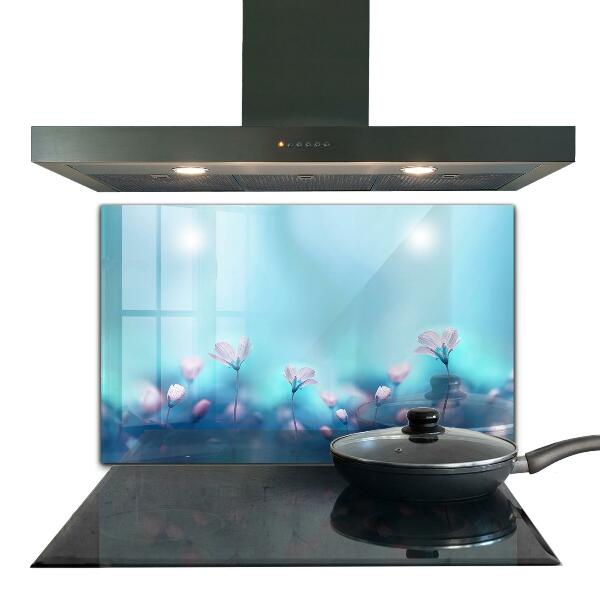 Paneles de vidrio para la cocina Flores detrás de la niebla de la mañana