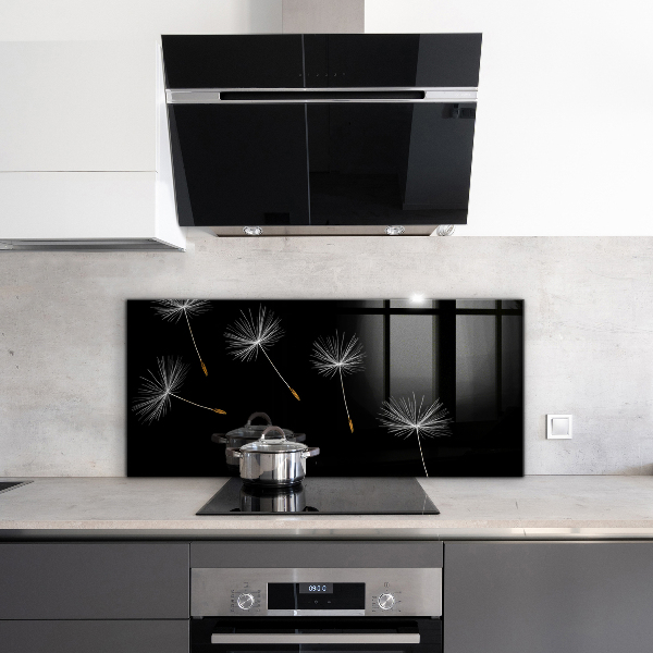 Paneles de vidrio para la cocina Dientes de león en el viento