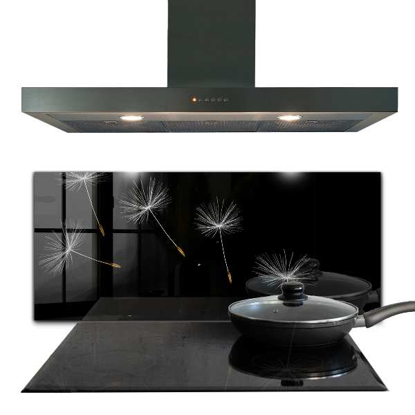 Paneles de vidrio para la cocina Dientes de león en el viento