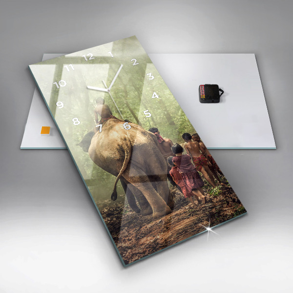 Reloj de vidrio vertical Niños guiando a un elefante - espejomat.es