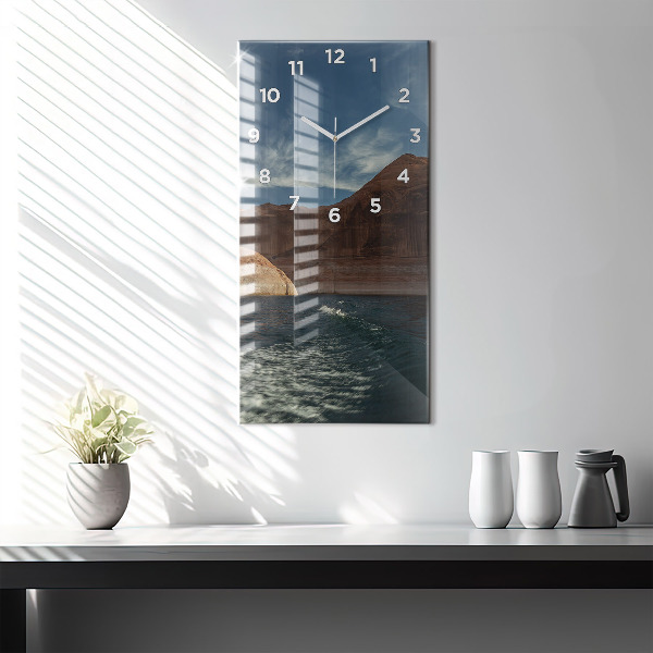 Reloj de vidrio vertical Persona sobre esquís acuáticos - espejomat.es