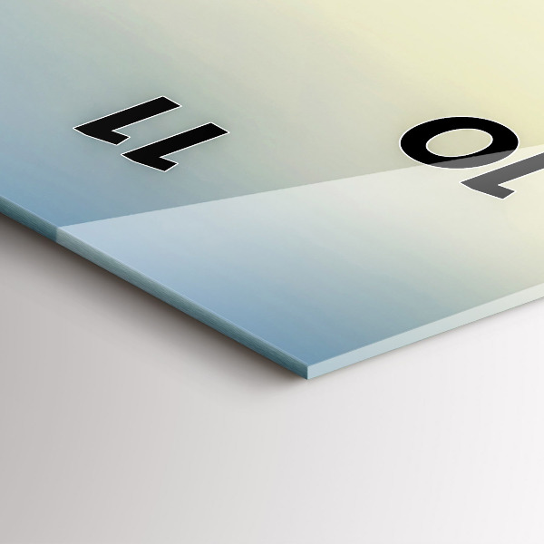 Reloj vertical Puesta de sol sobre montañas - espejomat.es