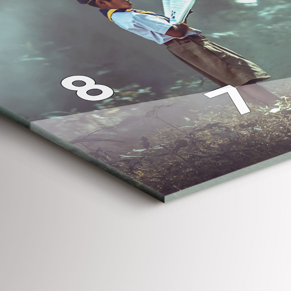 Reloj horizontal Niño leyendo un libro