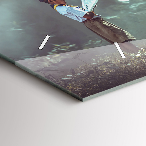 Reloj horizontal Niño leyendo un libro