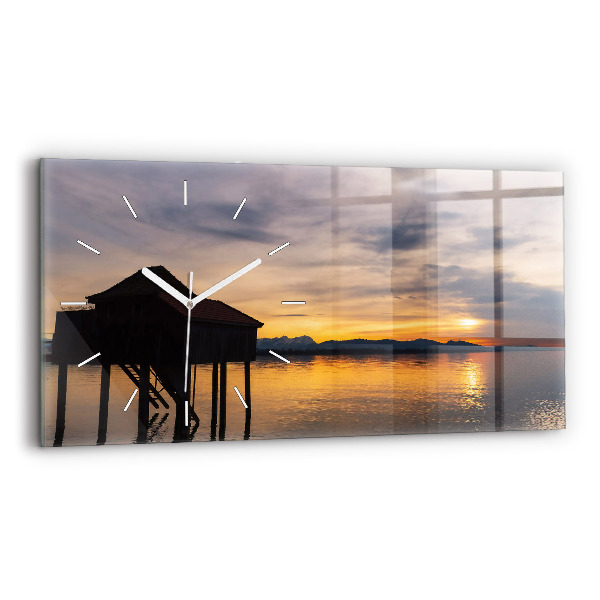 Reloj horizontal Puesta de sol sobre un lago