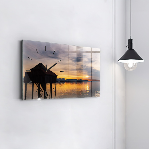 Reloj horizontal Puesta de sol sobre un lago