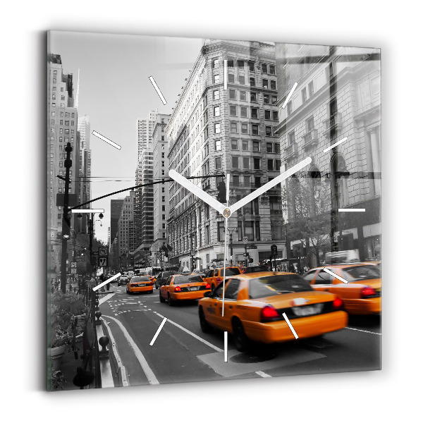 Reloj cuadrado Manhattan y taxis