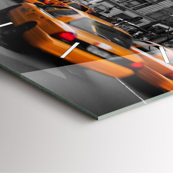 Reloj cuadrado Manhattan y taxis